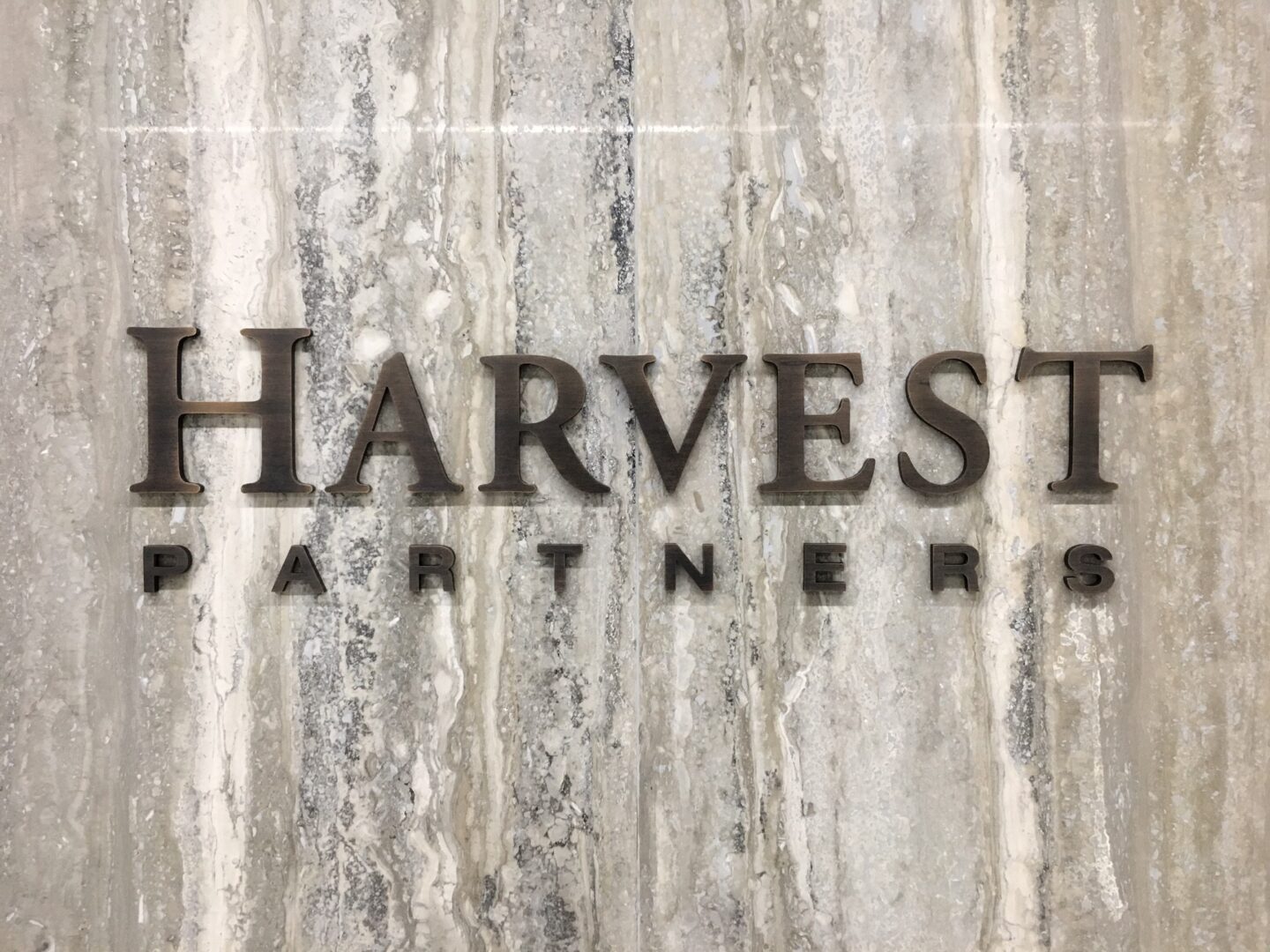 harvest partners oxidized cut letter logo 2